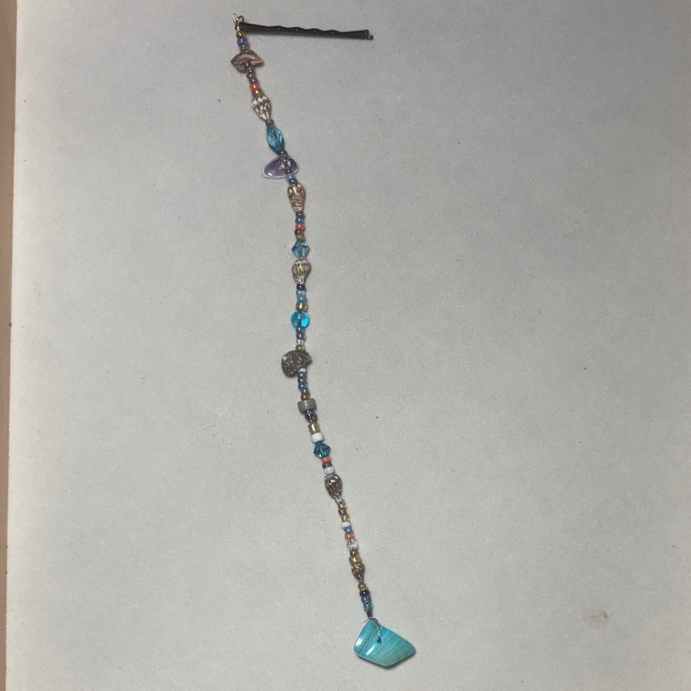 Hair beads with shells and shine